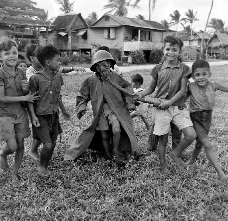 WW2 Photo WWII Children on Guam Playing with Gas Mask 1945 World War Two / 1592