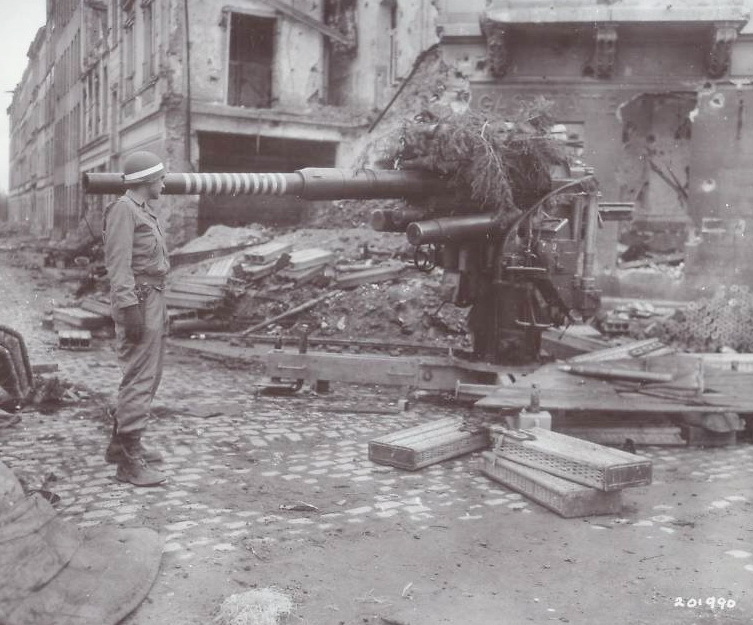 WWII B&W Photo US Soldier Inspecting German 88mm Gun WW2 World War Two / 1130