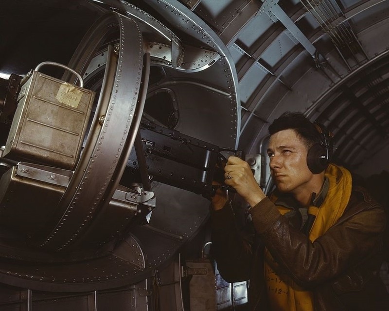 American aviator tests machine gun on B-17 bomber – New 8×10 World War II Photo