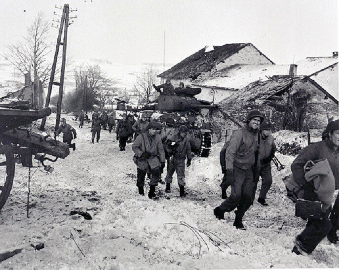 U.S. Troops move through village during Battle of the Bulge 8×10 WWII Photo 145a