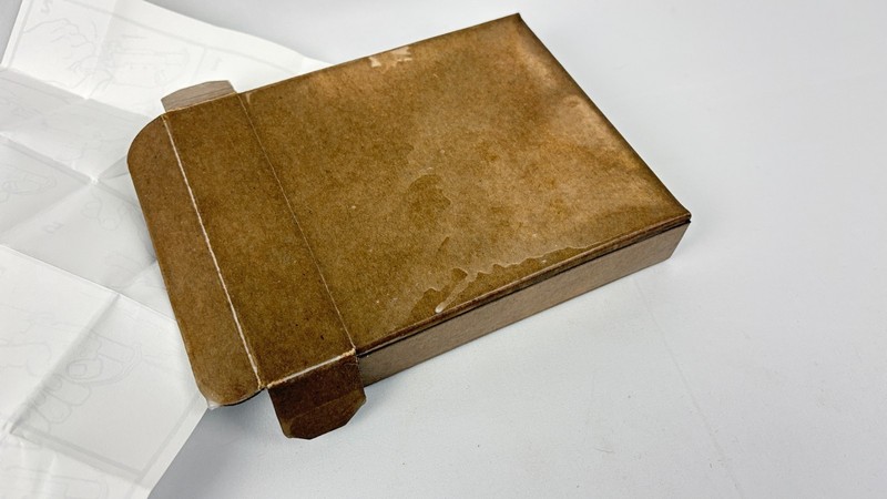 WWII Liberator Pistol Waxed Box, Ejector Rod, & Instructions gallery