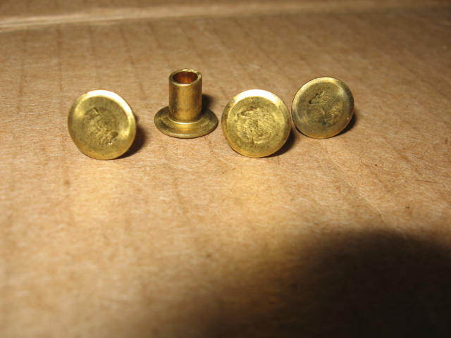 US M1 paratrooper carbine cheek pad rivet set. Marked 7-4.