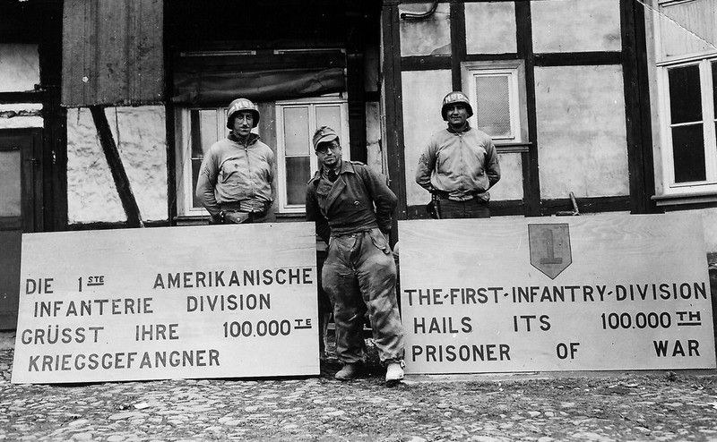 WWII B&W Photo US 1st Infantry Division 100,000th German POW WW2 / 1255