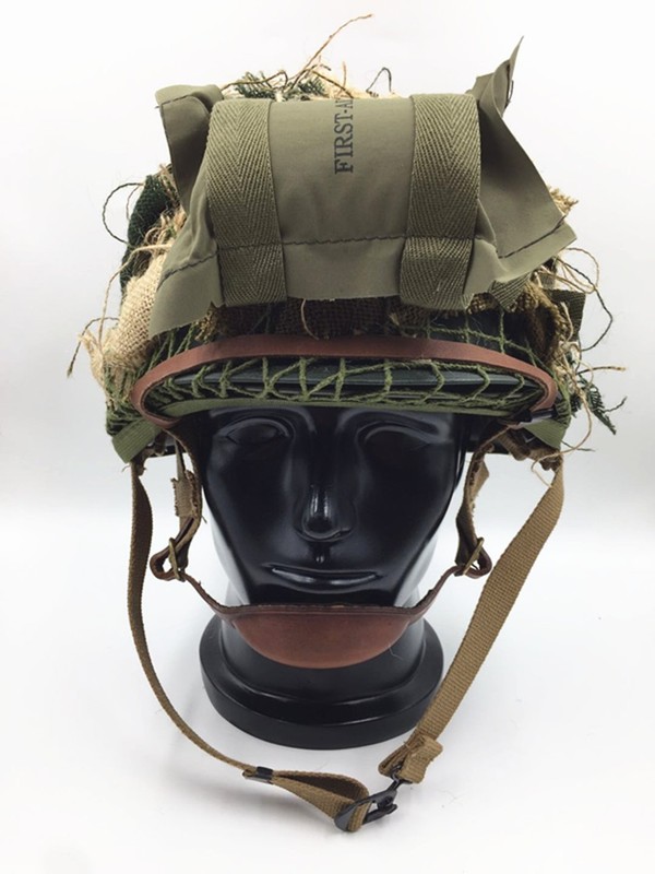 WW2 US ARMY ALRBORNE M1C HELMET WITH AIRBORNE TROOPS AND CAMOUFLAGE NET gallery